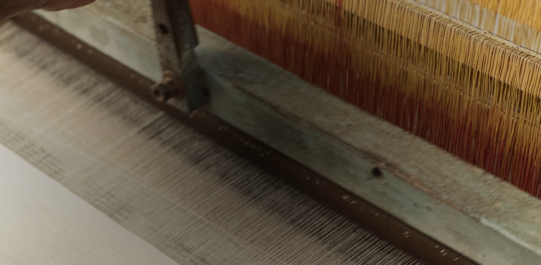 Close-up of a traditional handloom weaving cashmere yarn